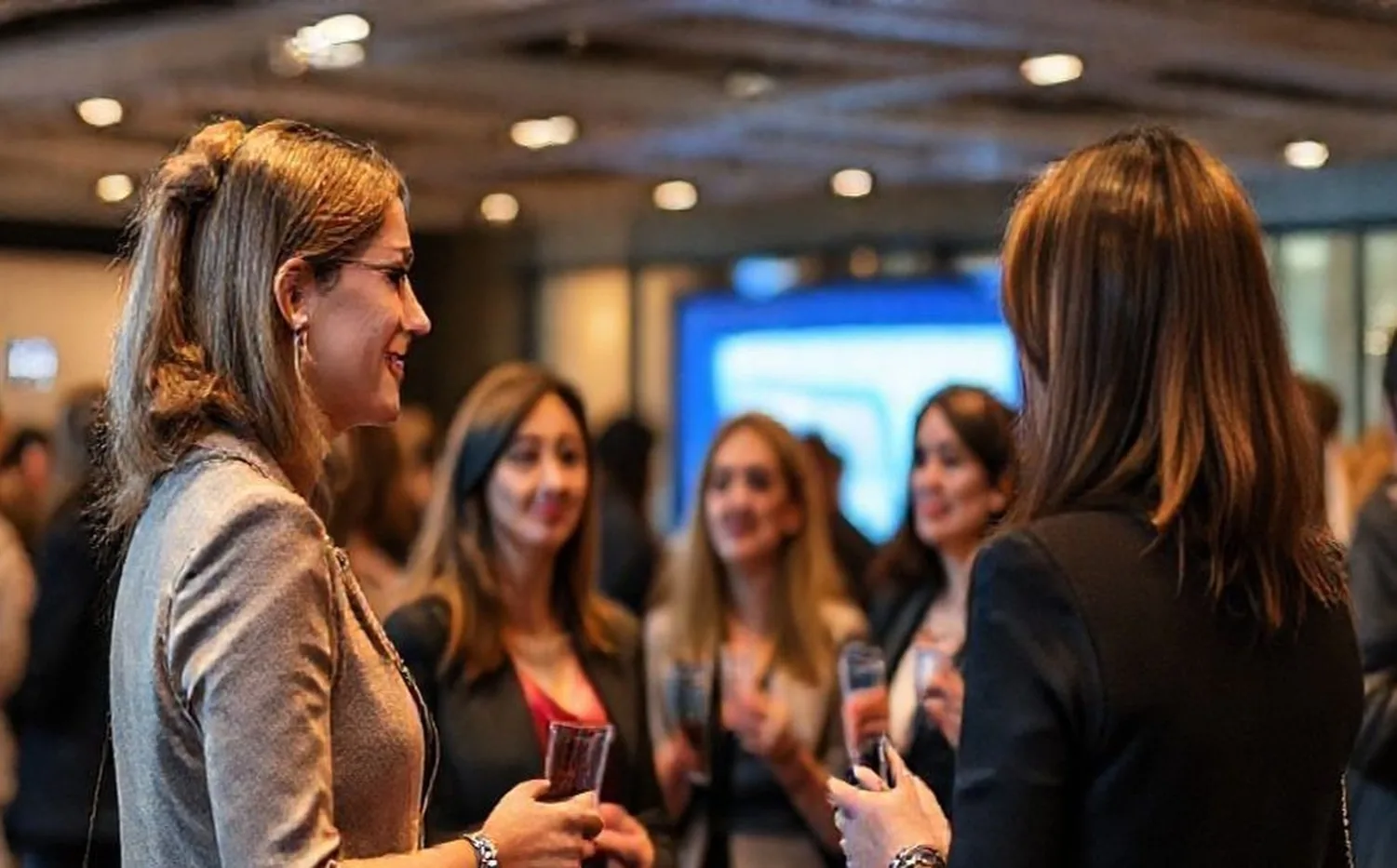 Women networking at professional business event
